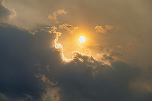 Hazy Sun Behind Clouds