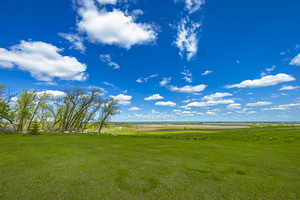 Green Valley Under a Blue Sky