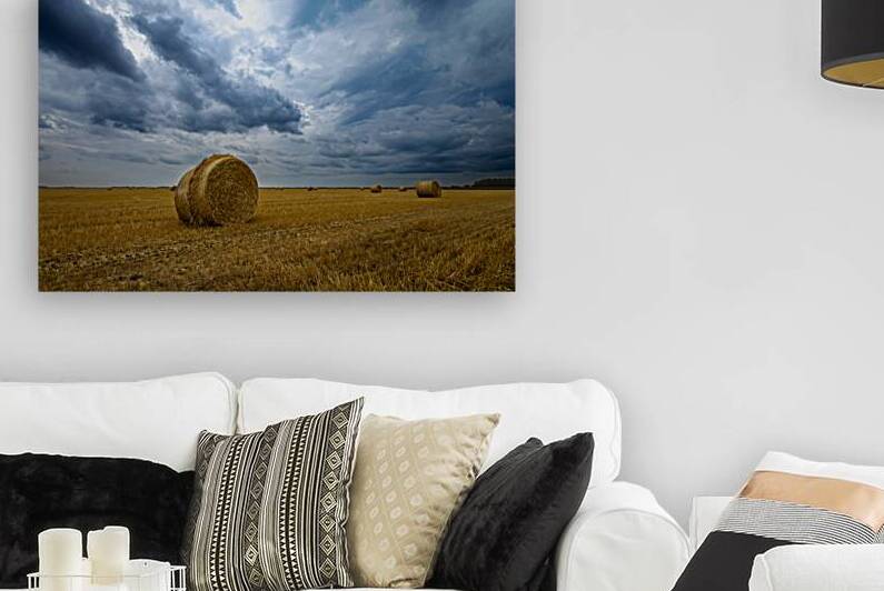 Hay Bales Under a Cloudy Sky by Marc Gilbert Photography